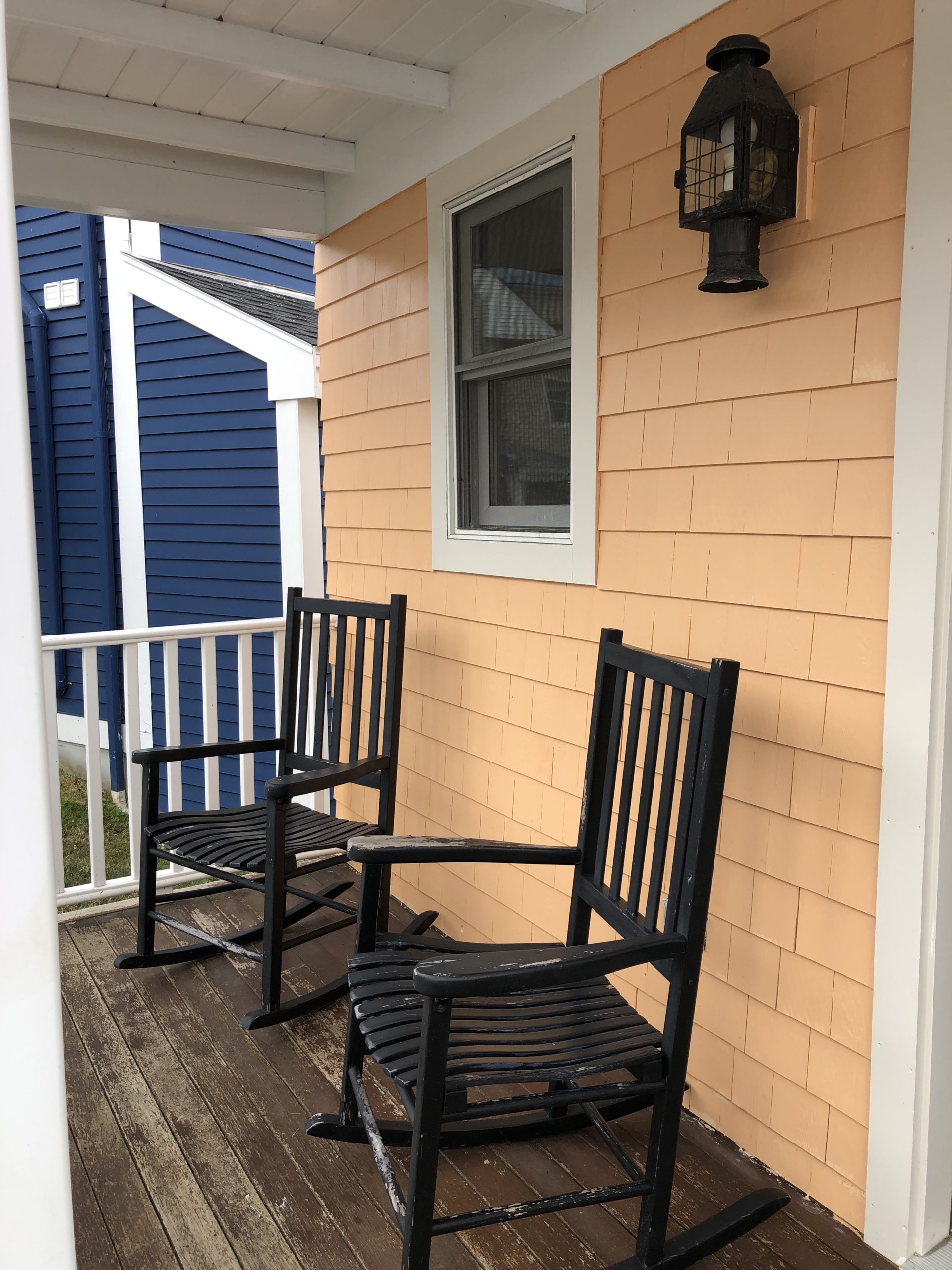 rocking chairs on porch of cottage