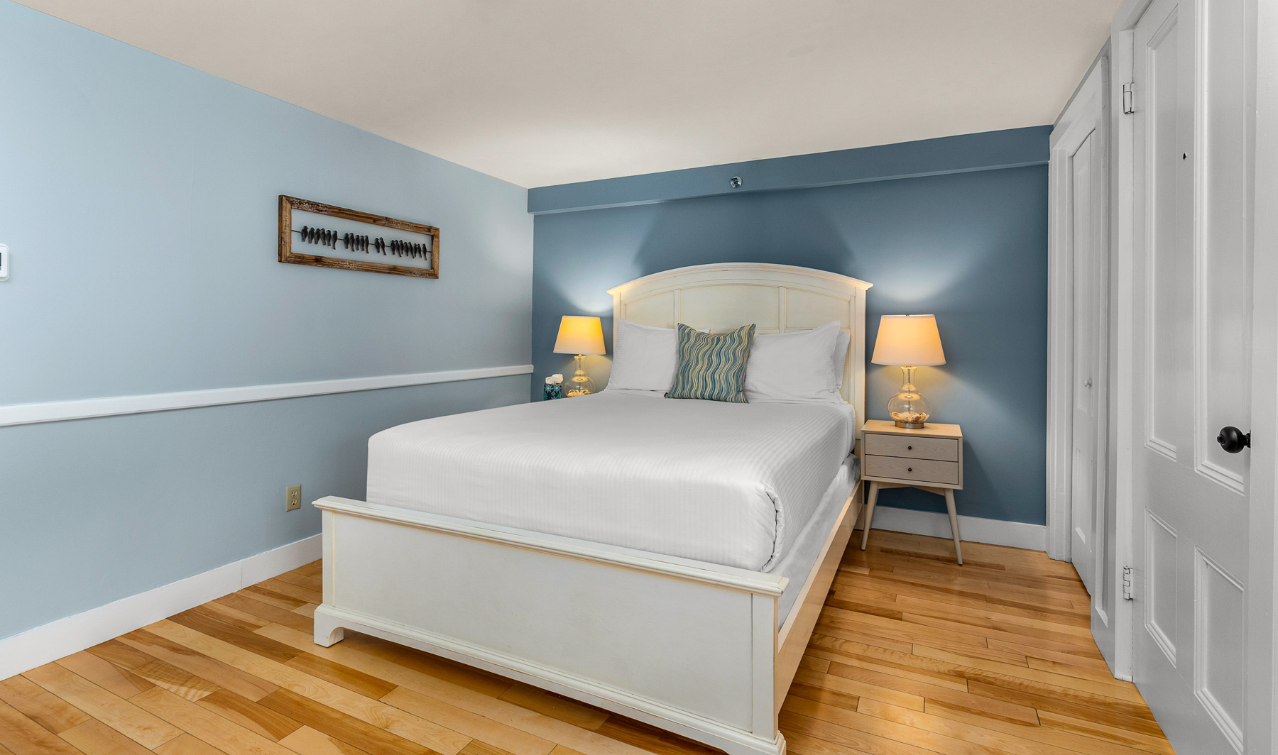guestroom with blue accent wall